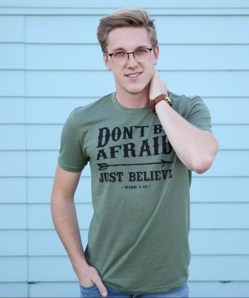 Man wearing military green melange Christian T shirt with black words "Don't be afraid - Just believe"